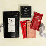 Collection of Seahorse hot chocolate mix, chocolate bars, and chocolate sampler on a light beige background