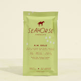 Seahorse Chocolate A.M. Gold packaging on a light yellow background