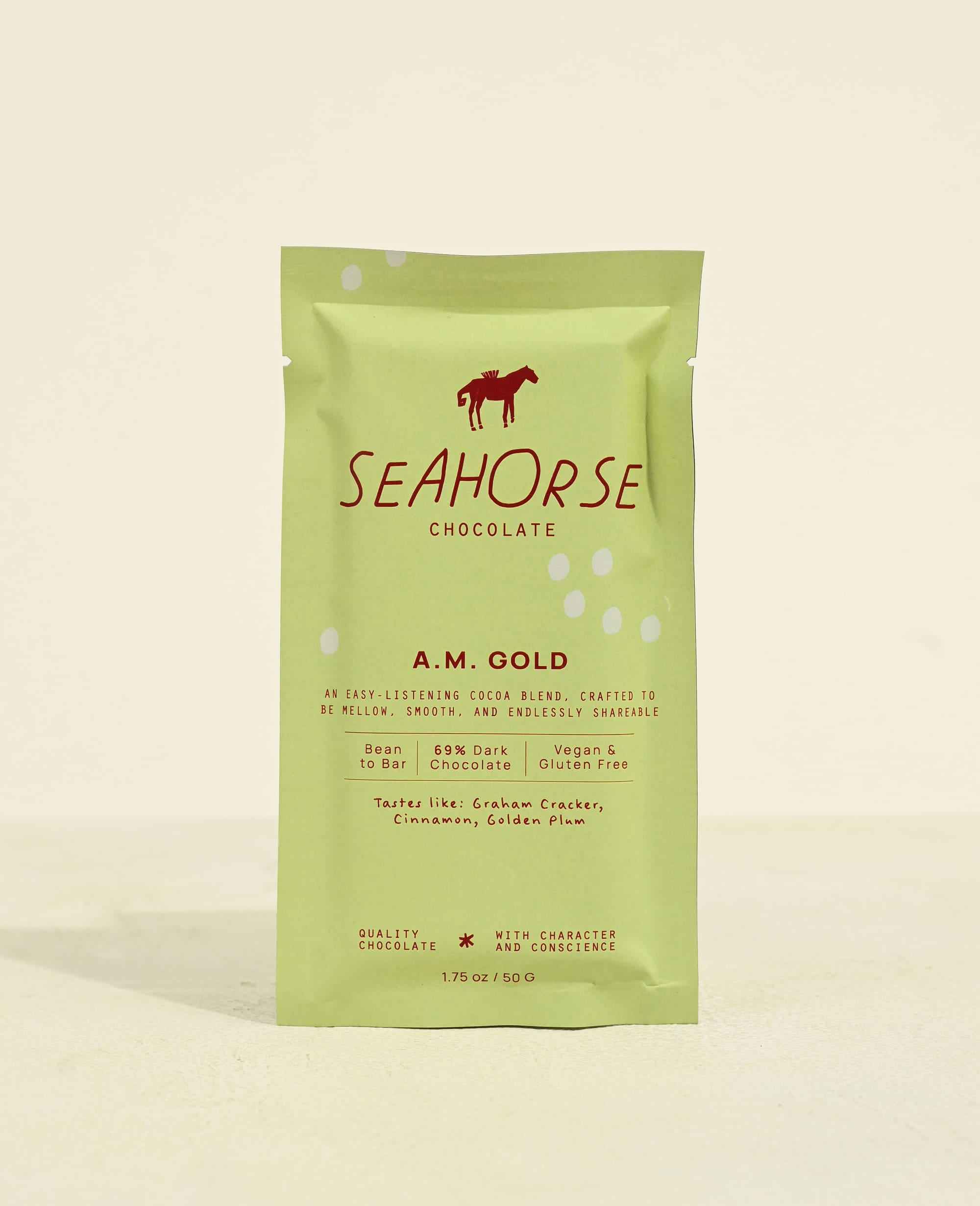 Seahorse Chocolate A.M. Gold packaging on a light yellow background
