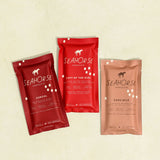Three Seahorse Chocolate bars on a beige background