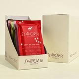 Seahorse Chocolate bars in a cardboard display box on a beige background