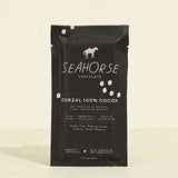 Seahorse Chocolate Zorzal 100% Cocoa packaging on a beige background