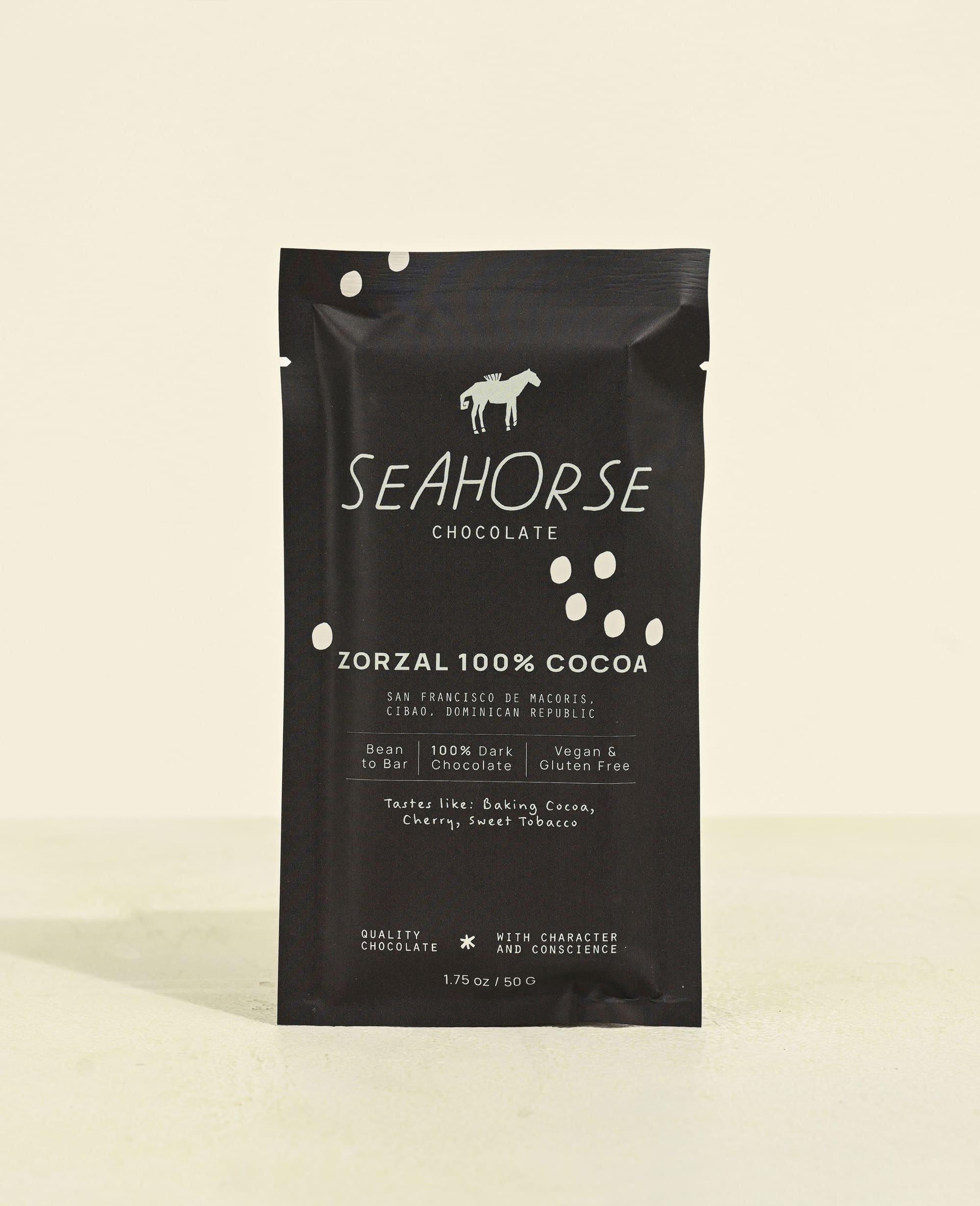 Seahorse Chocolate Zorzal 100% Cocoa packaging on a beige background