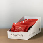 Box of Seahorse chocolate bars on a neutral background