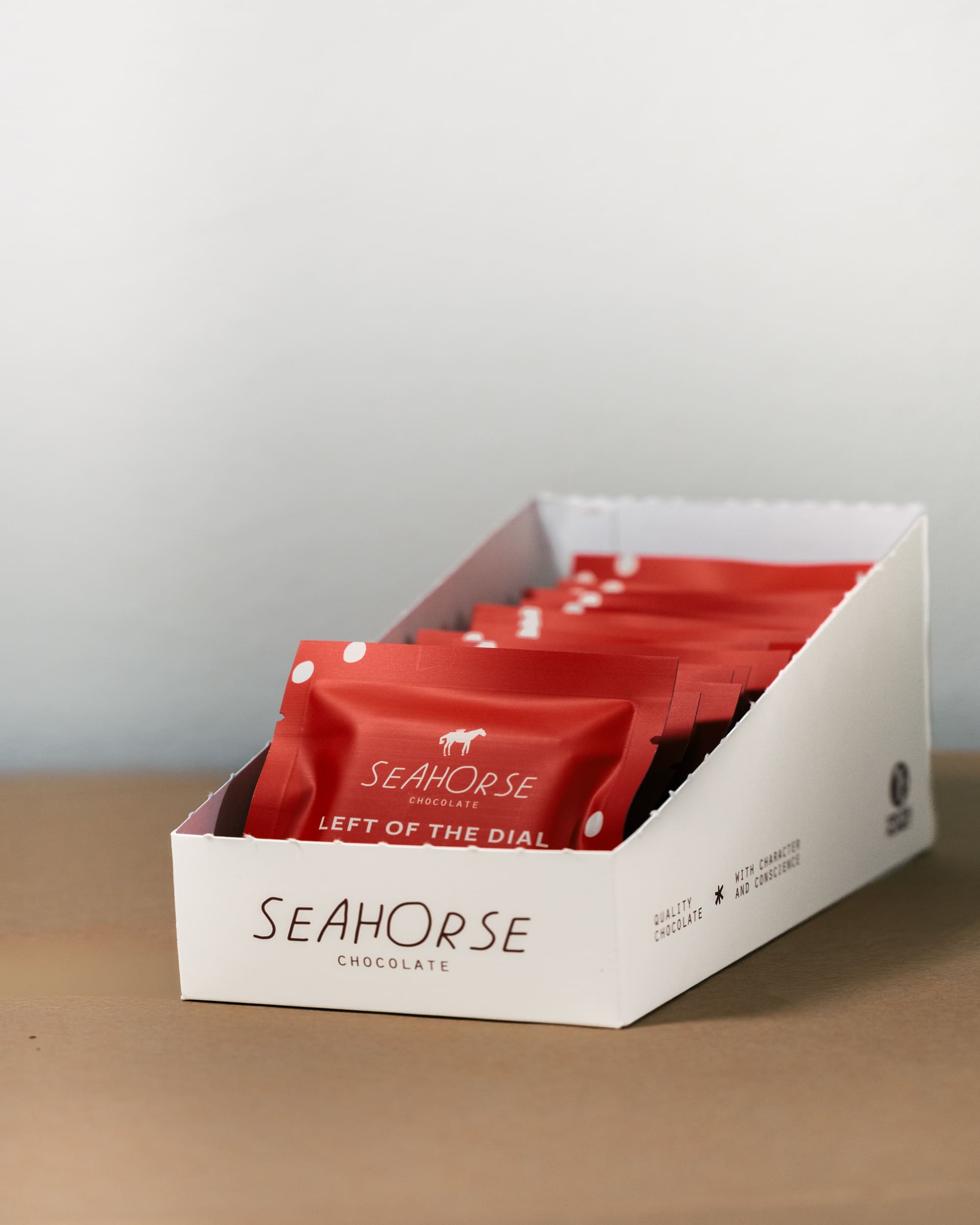Box of Seahorse chocolate bars on a neutral background